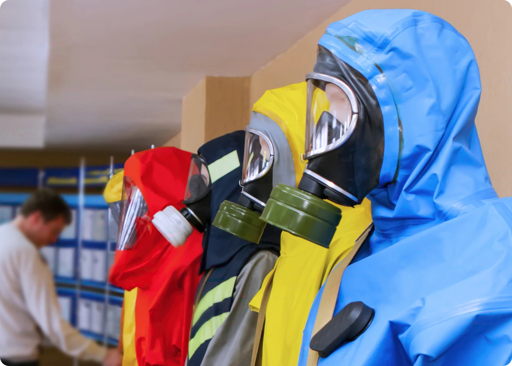 Protective suits and masks on display.